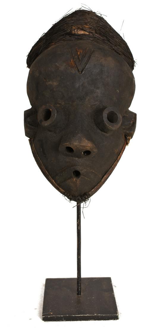 Mbangu distorted mask – Wood, Textile – (1 of 8)