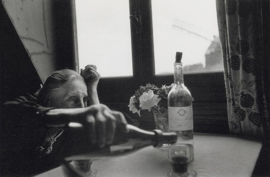 BRUCE DAVIDSON - The Widow of Montmarte, 1956: Artist: Bruce Davidson Title: The Widow of Montmarte, 1956 Medium: Photo Litho, 2009, Germany Dimensions: 9.6x6.3" Description: Heat Wax Mounted on 11x14" Conservation Board Artist Bio: Bruce Davidson