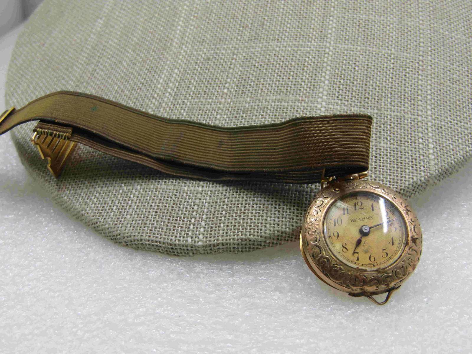 Antique Hallmark 20 Yr. Pocketwatch, Hayward Fob 1/10: Antique Hallmark 20 Yr. Pocketwatch, Hayward Fob 1/10 10KT GF. Marked inside case 15 JLD 3 ADJ and Hallmark Swiss. It is on a brown Hayward Band style fob and marked 1/10 and signed Hayward. Engraved 