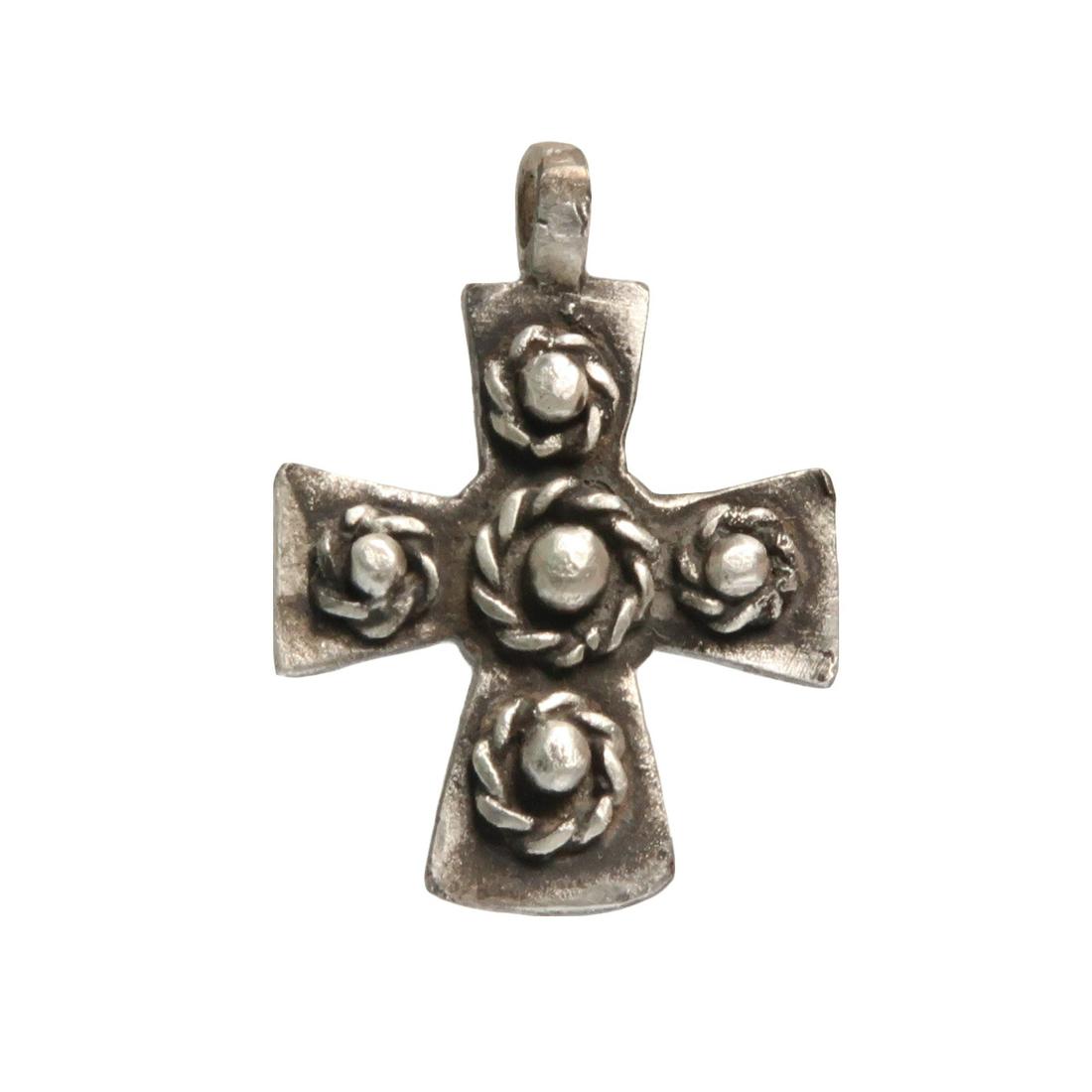 Byzantine Silver Cross: Title: Byzantine Silver Cross Date/Origin: Byzantine, c. 9th Century A.D. Description: Small silver cross with flaring arms, with applied granules surrounded by rope pattern wires. Suspension loop. Ma