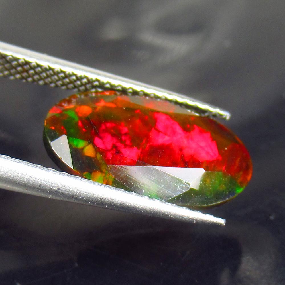 3.67 Ctw Natural Ethiopian Black Fire Opal Oval Cut: No Reserve! Title: 3.67 Ctw Natural Ethiopian Black Fire Opal Oval Cut Stone Clarity: Translucent Gemstones: Black Opal Carat Weights: 3.67 Size/Dimensions: 15.40 x 9.40 x 5.80 mm Additional Informati