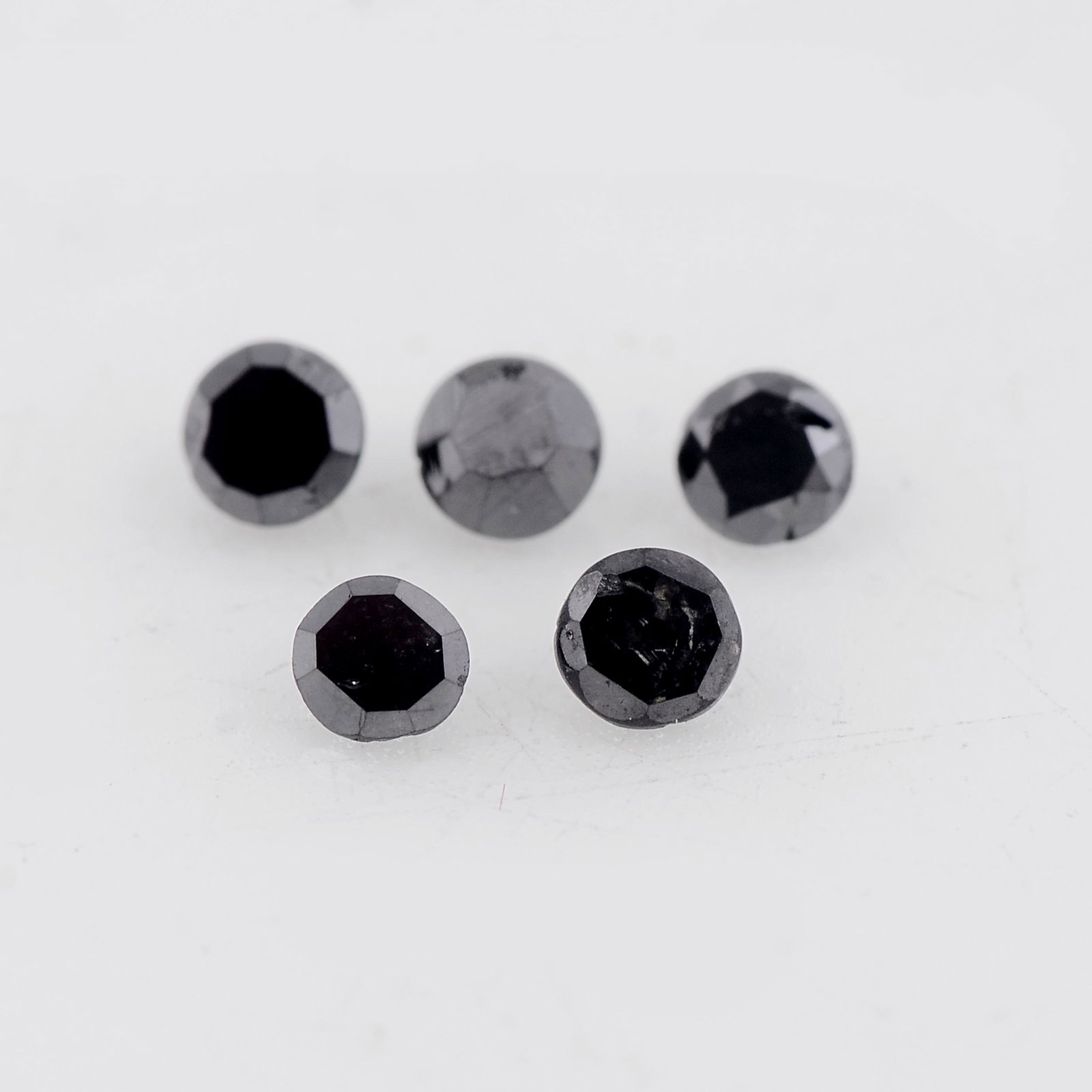 0.07 Carat Black Color Natural Round Diamond Loose Gemstone 5 Pieces: No Reserve! Title: 0.07 Carat Black Color Natural Round Diamond Loose Gemstone 5 Pieces Brand: Gems Trading Center Gemstones: Diamond Carat Weights: 0.07 Size/Dimensions: 1.5L x 1.5W mm Shipping: Dome