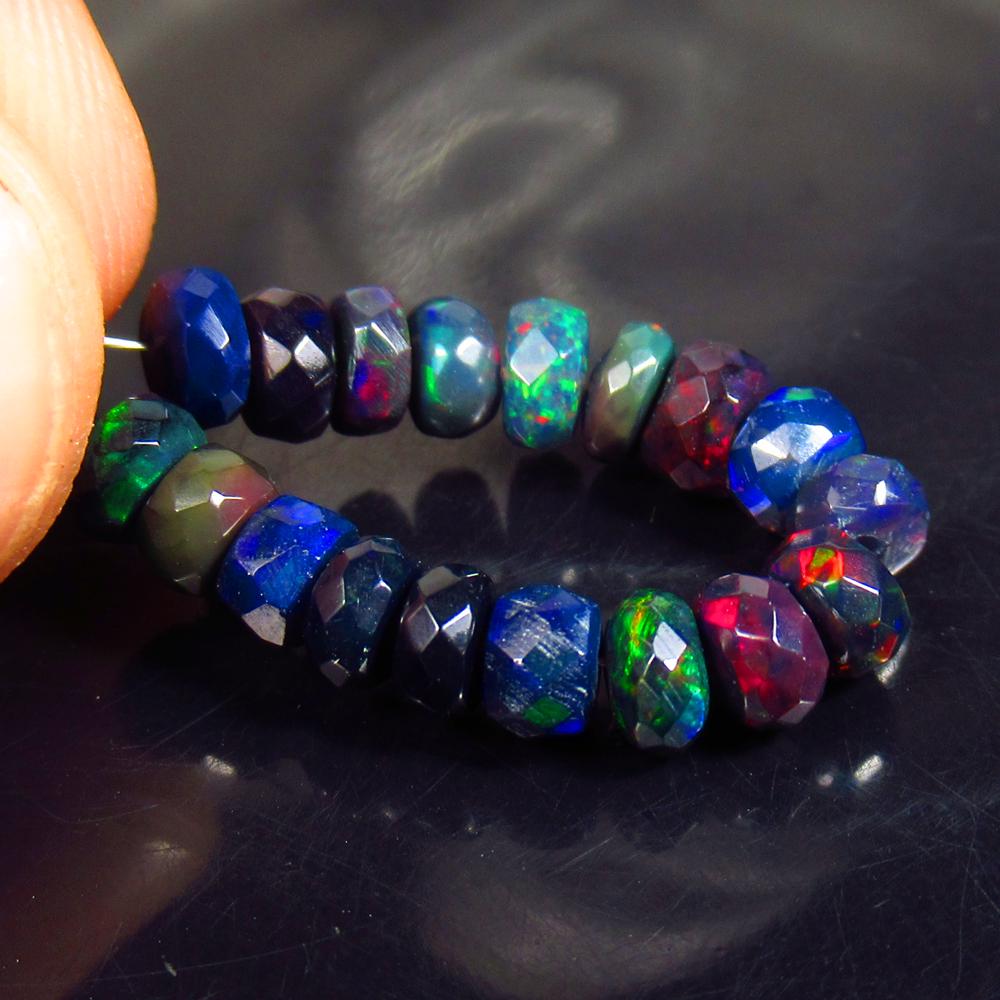 5.65 Ctw Natural 18 Drilled Faceted Black Opal Beads: No Reserve! Title: 5.65 Ctw Natural 18 Drilled Faceted Black Opal Beads Stone Clarity: Translucent Gemstones: Faceted Black Opal Beads Carat Weights: 5.65 Size/Dimensions: 4.20 - 5.10 mm / 18 Pcs Addi