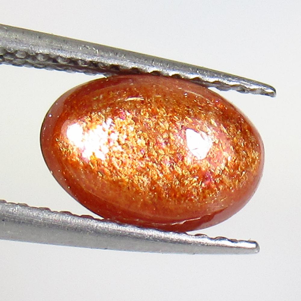 1.65 Ctw Natural Orange Sunstone Oval Cab: No Reserve! Title: 1.65 Ctw Natural Orange Sunstone Oval Cab Stone Clarity: Opaque Gemstones: Sunstone Carat Weights: 1.65 Size/Dimensions: 9.30 x 6.50 x 3.70 mm Additional Information: Excellent Oval