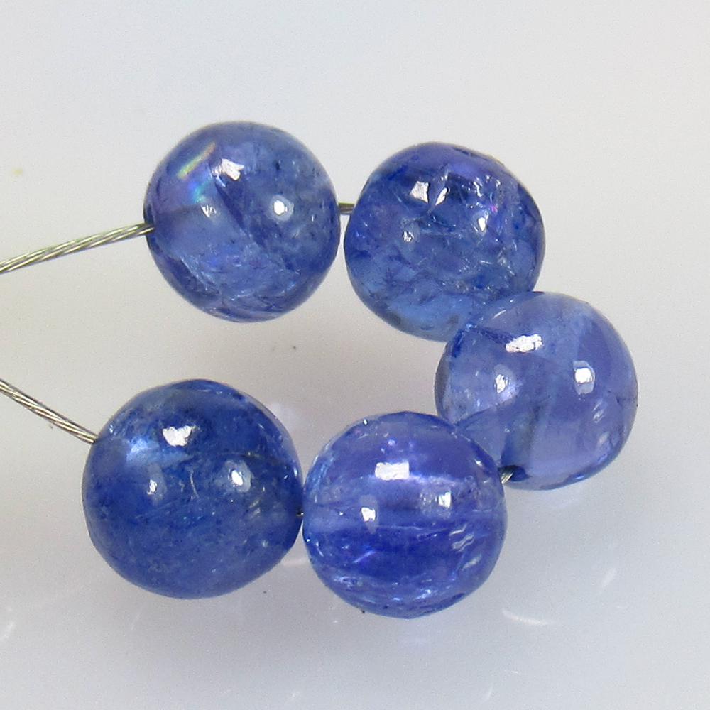 5.96 Ctw Natural 5 Drilled Tanzanite Ball Beads: No Reserve! Title: 5.96 Ctw Natural 5 Drilled Tanzanite Ball Beads Stone Clarity: Transparent Gemstones: Tanzanite Beads Carat Weights: 5.96 Size/Dimensions: 5.00 - 5.30 mm / 5 PC's Additional Informa