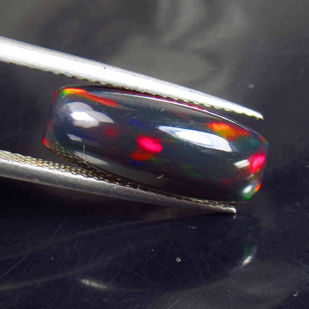 3.38 Ctw Natural Ethiopian Black Fire Opal Cushion Cab: No Reserve! Title: 3.38 Ctw Natural Ethiopian Black Fire Opal Cushion Cab Stone Clarity: Translucent Gemstones: Black Opal Carat Weights: 3.38 Size/Dimensions: 17.00 x 7.20 x 5.10 mm Additional Inform