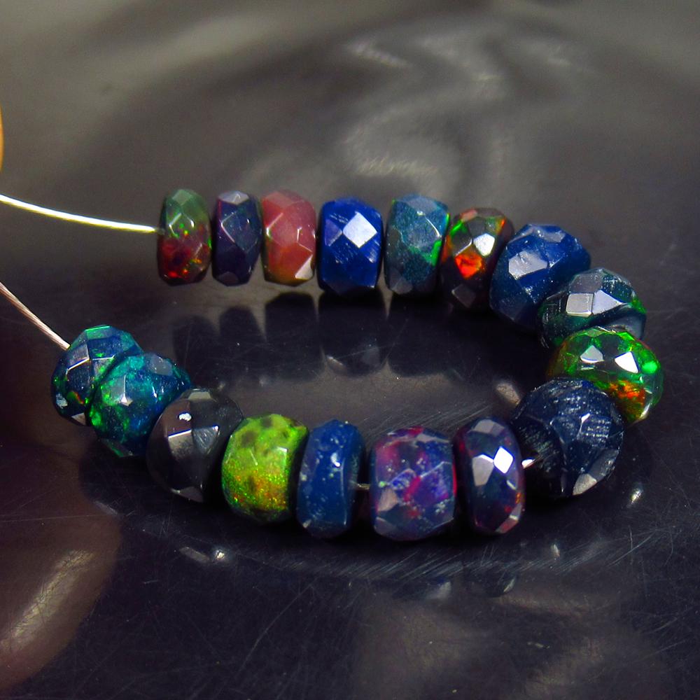 6.01 Ctw Natural 17 Drilled Faceted Black Opal Beads: No Reserve! Title: 6.01 Ctw Natural 17 Drilled Faceted Black Opal Beads Stone Clarity: Translucent Gemstones: Faceted Black Opal Beads Carat Weights: 6.01 Size/Dimensions: 4.40 - 5.00 mm / 17 Pcs Addi