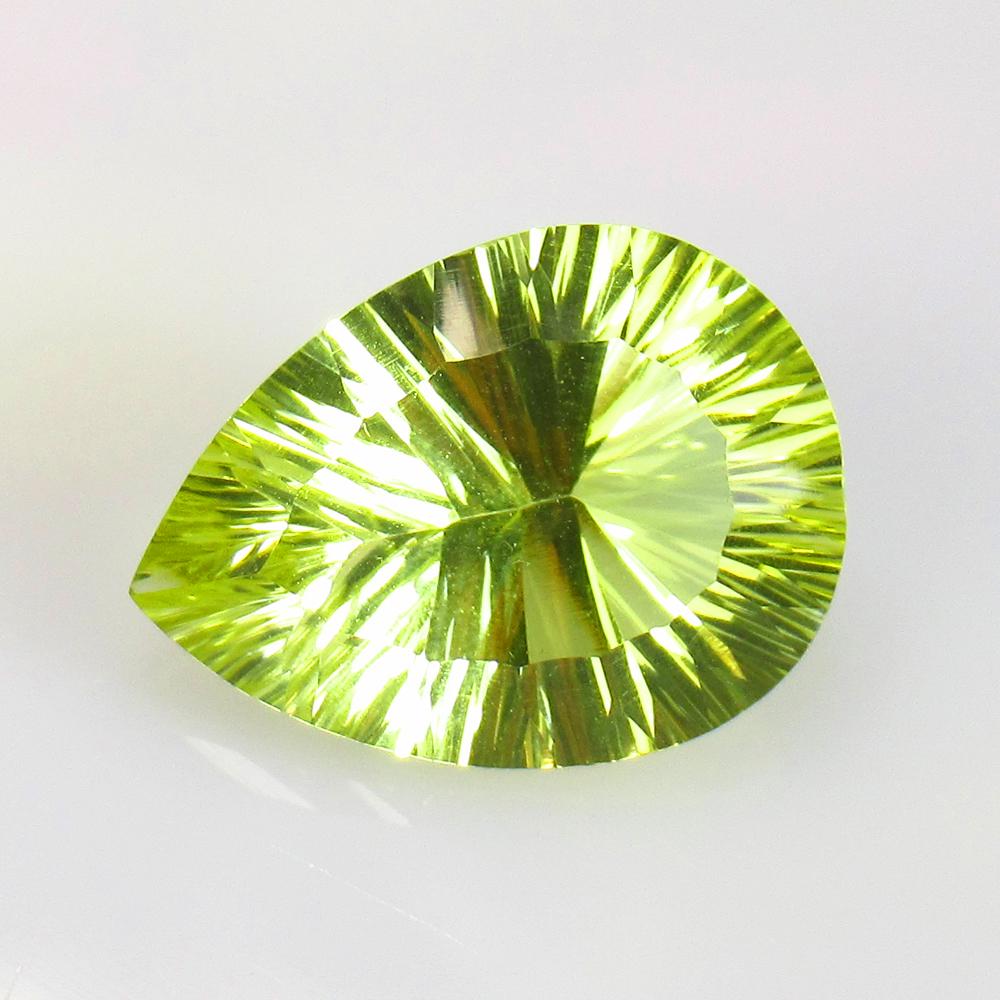 22.13 Ctw Natural Lemon Quartz Concave Cut: No Reserve! Title: 22.13 Ctw Natural Lemon Quartz Concave Cut Stone Clarity: VVS Gemstones: Lemon Quartz Carat Weights: 22.13 Size/Dimensions: 24.00 x 17.70 x 11.10 mm Additional Information: Top Clas