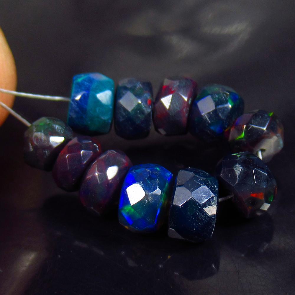 5.65 Ctw Natural 18 Drilled Faceted Black Opal Beads: No Reserve! Title: 5.65 Ctw Natural 18 Drilled Faceted Black Opal Beads Stone Clarity: Translucent Gemstones: Faceted Black Opal Beads Carat Weights: 5.65 Size/Dimensions: 4.20 - 5.10 mm / 18 Pcs Addi