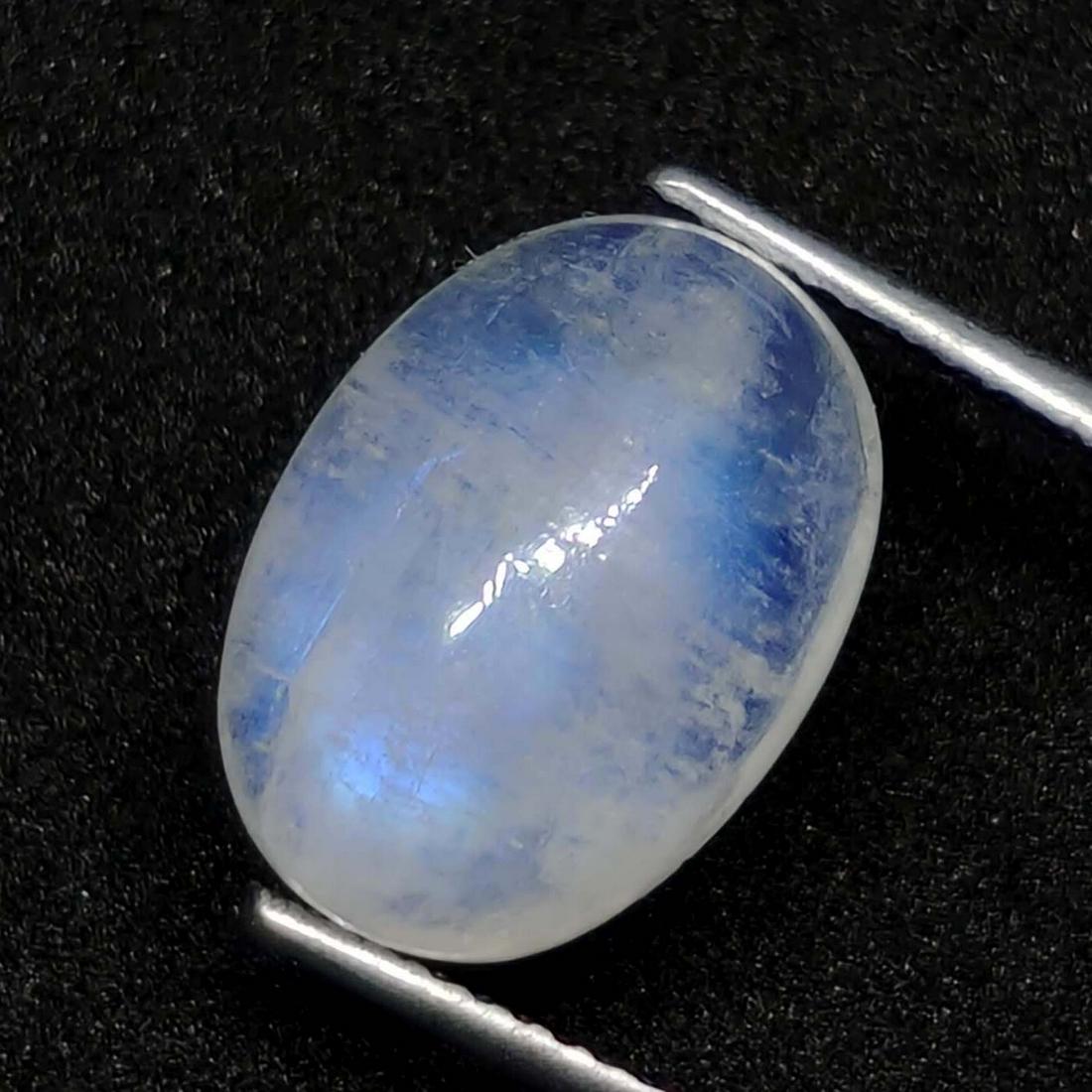5.25 ct Natural White Rainbow Moonstone: No Reserve! Gemstones: Rainbow Moonstone Carat Weights: 5.25 ct Size/Dimensions: 13 X 10 X 5 mm Origin : India Shipping: Domestic: Flat-rate of $7.00 to anywhere within the contiguous U.S. Internation