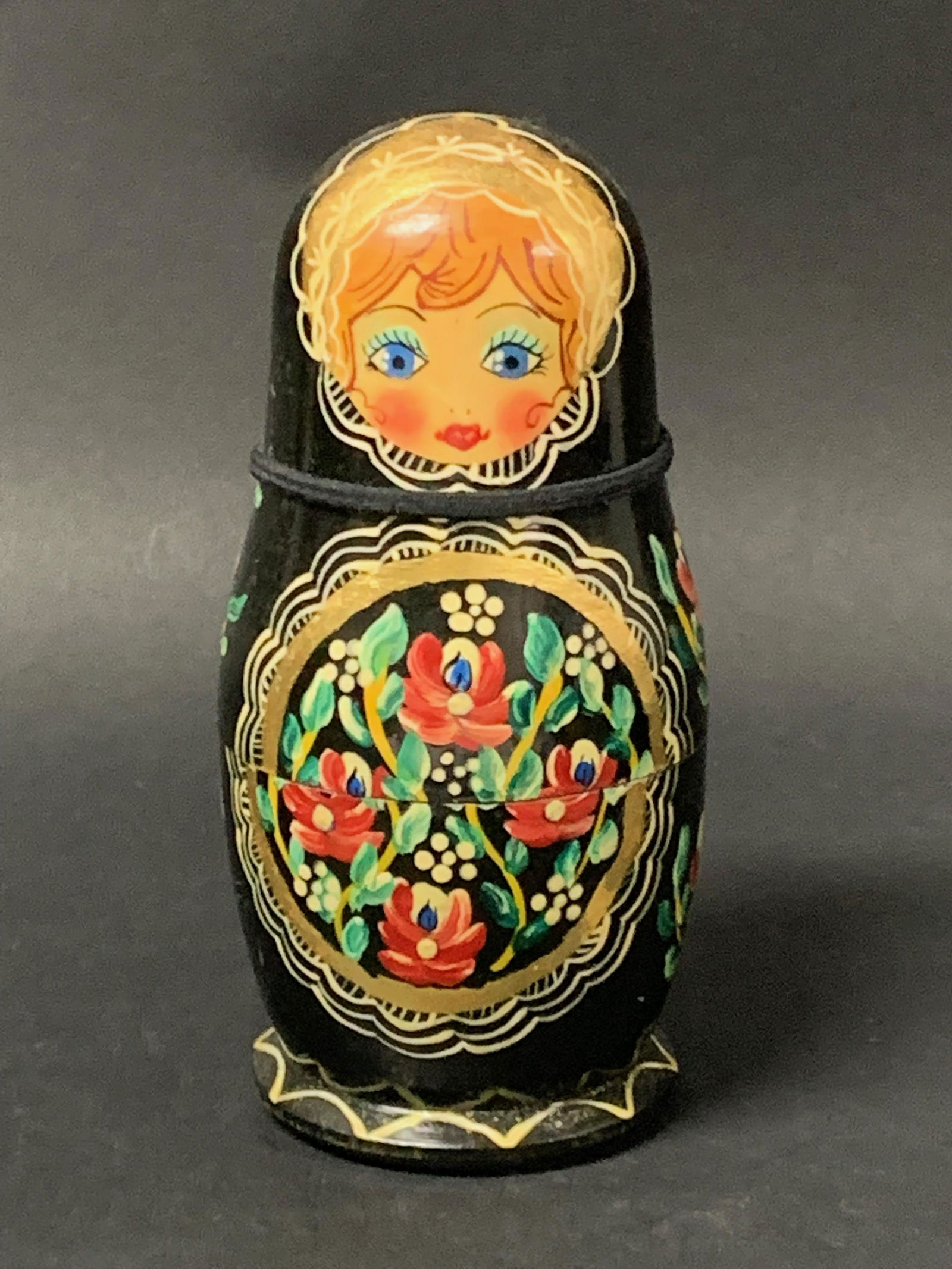 Russian Wooden Nesting Doll: Title: Russian Wooden Nesting Doll Date/Period: Mid 20th Century Material: Wood Dimension: 6.75" h x 2.75" w Description: Russian Wooden Nesting Doll Reserve: $40.00 Shipping: Domestic: Flat-rate of $