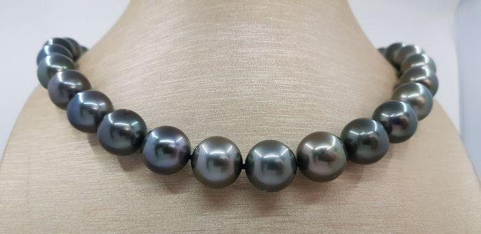 12x14.2mm Large Cherry Green Tahitian Pearls - 14 kt. White gold - Necklace: Title: 12x14.2mm Large Cherry Green Tahitian Pearls - 14 kt. White gold - Necklace Description: A luxury pearl necklace, made with near round Tahitian pearls, and completed with a solid invisible clas