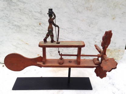 Early 20thc folk art whirligig: Title: Early 20thc folk art whirligigProvenance/Additional Information: Top hat is doffed when the blades turn. All original with good paint colors and surface. Custom iron base included. . 17" long