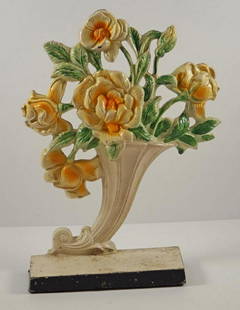 Yellow Roses Cast Iron Hubley Doorstop: Title: Yellow Roses Cast Iron Hubley DoorstopAdditional Information: Beautiful sculpture form of Roses in Slant Vase cast iron Antique Doorstop. Wonderful color in eye-catching yellow with green