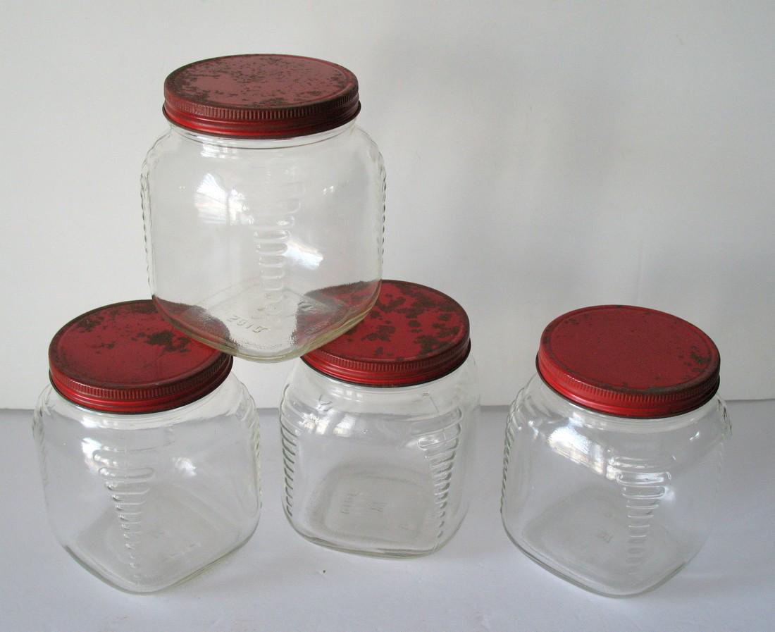 Group of four vintage country store seed jars. (1 of 3)