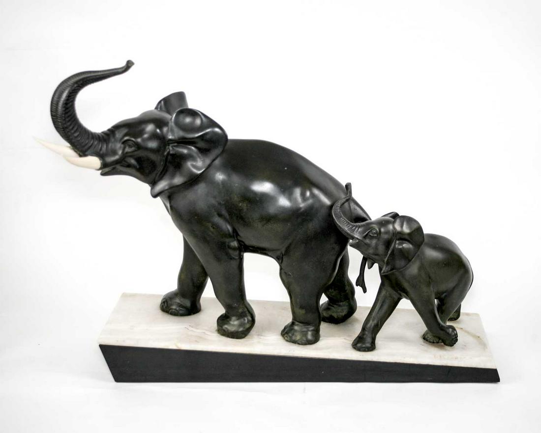 LARGE FRENCH ART DECO ELEPHANTS SCULPTURE IRENEE ROCHARD: Made in France in the 1930's this sculpture reflect the democratic desire of that time to produced affordable art . It is metal instead of bronze but the quality of design is here .It was done with th