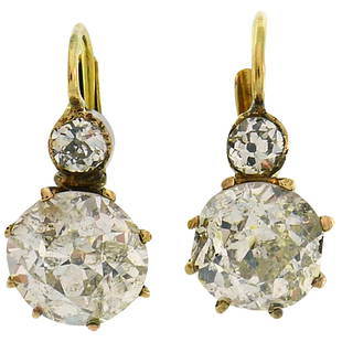 Victorian Diamond Yellow Gold Drop Earrings Two-Stone: Lovely Victorian diamond and 14 karat (tested) yellow gold two-stone drop earrings. The diamonds are Old European cut. Top diamonds are approximately 0.10-carat each. Bottom diamonds weigh
