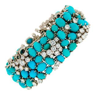 1960s French Turquoise Diamond Platinum Bracelet: Elegant and stylish bracelet created in France in the 1960's. Features sixty eight oval Persian turquoise and ninety seven diamonds. Turquoise varies in color from blue, to greenish blue. Diamonds