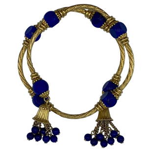Vintage Carlo Weingrill Yellow Gold Sodalite Lapis Bangle Bracelet: Product details: The bracelet is designed by Carlo Weingrill, it is made out of 18 karat yellow wired gold and lapis beaded detail with gold chain and lapis beads tassel on each end of the bangle,