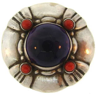 Georg Jensen Amethyst Coral Silver Pin Brooch Clip No.50: Fabulous pin created by Georg Jensen in the 1940's. Collectable and wearable, the brooch is a great addition to your jewelry collection. It measures 1.5 inches in diameter and weighs 32.4 grams.