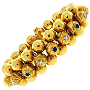 Ventrella Retro Yellow Gold Bracelet Diamond Sapphire, 1950s: Bold and articulated bracelet created by Italian jewelry house Ventrella in the 1950s. Volume and outstanding workmanship make the bracelet stand out. Elegant, very chic and wearable, the bracelet is