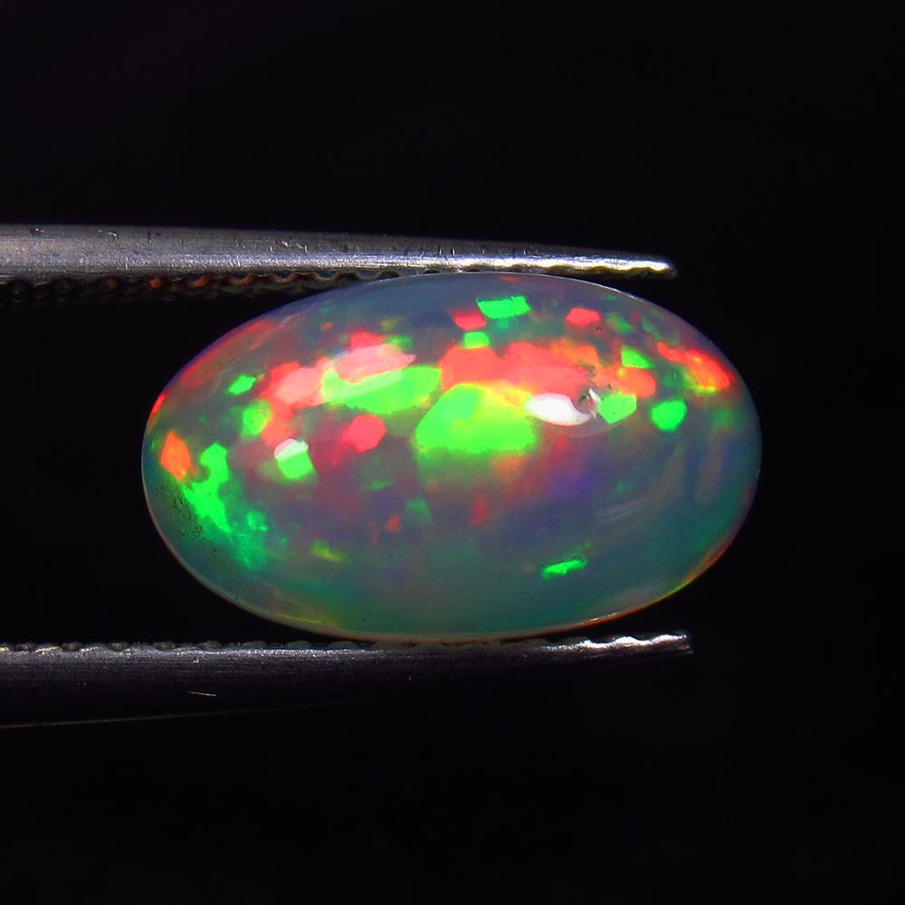 2.17 Ctw Natural Multi-Color Welo Opal Oval Cab: Title: 2.17 Ctw Natural Multi-Color Welo Opal Oval Cab Stone Clarity: Transparent Gemstones: Opal Carat Weights: 2.17 Size/Dimensions: 12.20 x 7.20 x 5.00 mm Additional Information: Shape - Oval Cab /