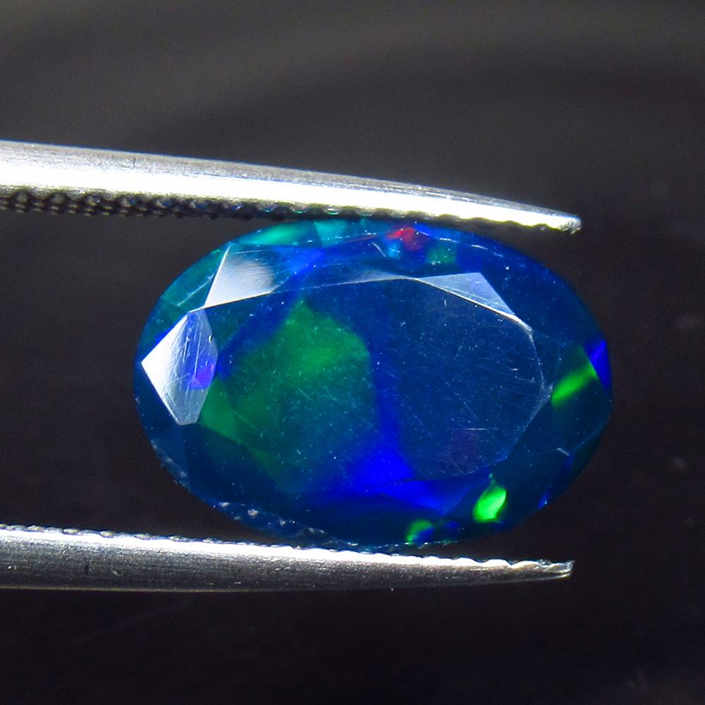 2.87 Ct Natural Ethiopian Black Fire Opal Oval Cut: Title: 2.87 Ct Natural Ethiopian Black Fire Opal Oval Cut Stone Clarity: Translucent Gemstones: Natural Black Opal Carat Weights: 2.87 Size/Dimensions: 12.20 x 8.60 x 6.70 mm Additional Information: E