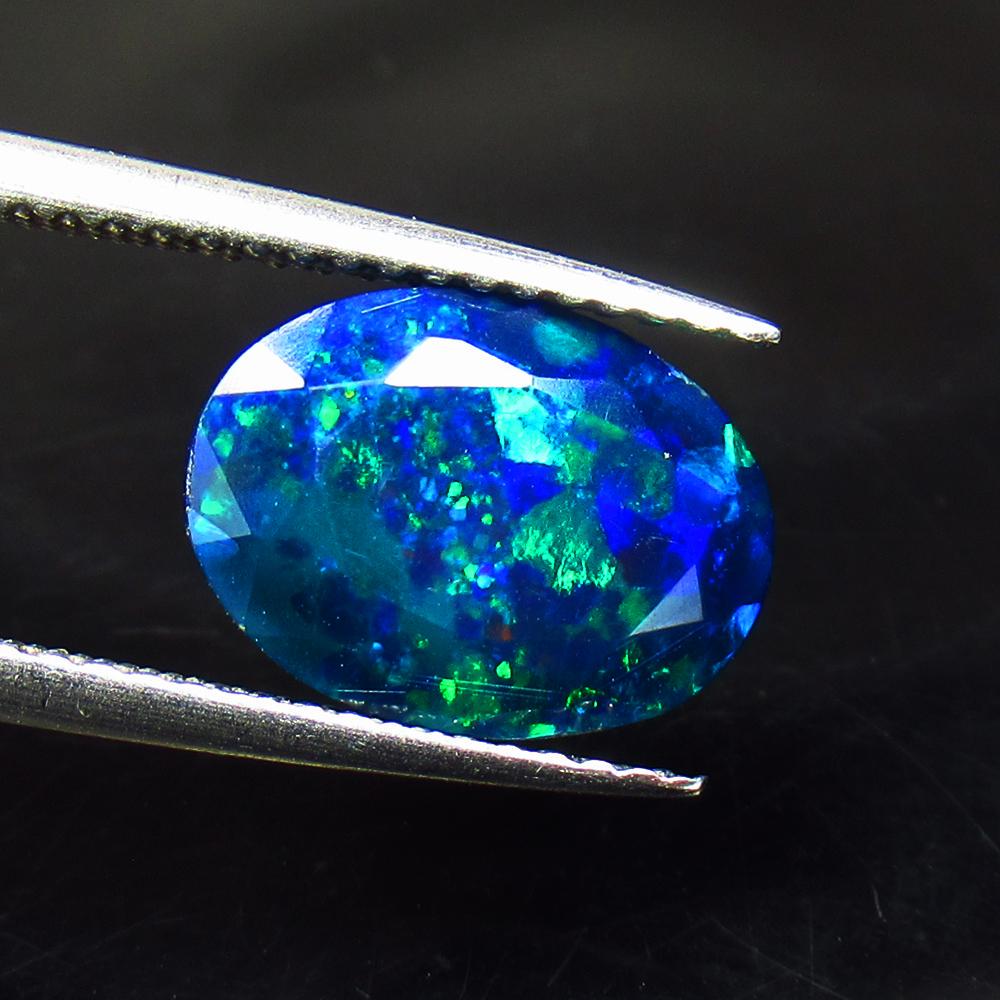 2.08 Ctw Natural Ethiopian Black Fire Opal Oval Cut (1 of 3)