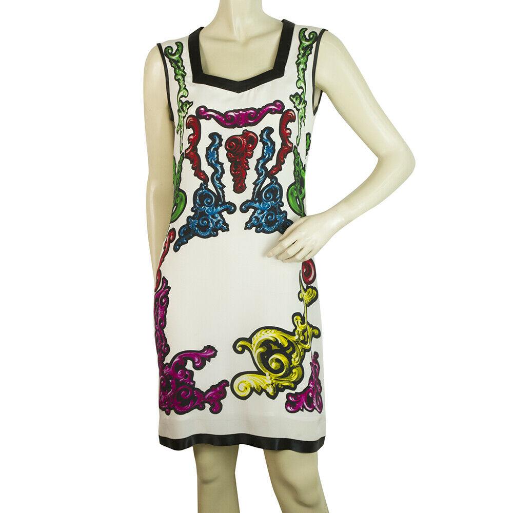 Pollini Multicolored & White Sleeveless Silk Pencil Sheath Dress: Pollini Multicolored & White Sleeveless Silk Pencil Sheath Dress Carve an ultra-flattering silhouette in this stunning dress from Pollini. This pencil dress with fantastic multicolored abstract patter