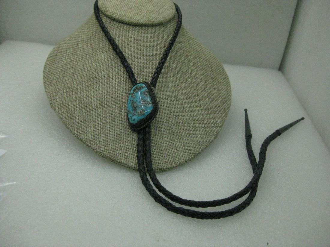 Vintage Sterling Southwestern Turquoise Bolo Tie, Pilot Mountain, Signed MSL, 38": Vintage Sterling Southwestern Turquoise Bolo Tie, Pilot Mountain, Signed MSL, 38". This has a stone that is smooth finfished with a very nice light to medium blue with some darker areas and what looks