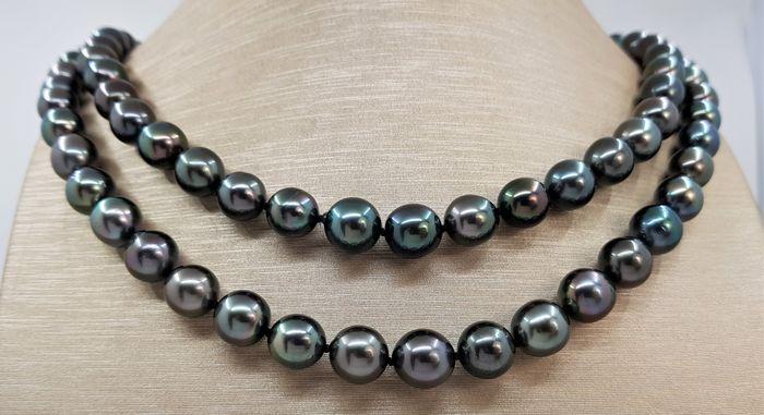 8x11mm Shimmering Green Tahitian pearls - Necklace: Title: 8x11mm Shimmering Green Tahitian pearls - Necklace Description: A beautiful double pearl necklace of peacock and aubergine green near round Tahitian pearls with exceptional lustre, finished wit