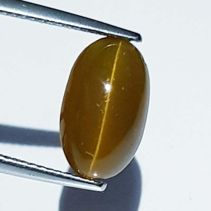 Natural Apatite cat's Eye 9.35 ct: No Reserve! Title: Natural Apatite cat's Eye 9.35 ct Color/Clarity: Opaque Gemstones: Loosegemstone Carat Weights: 9.35 Size/Dimensions: 13.20 x 8.00 x 9.00 Additional Information: Oval - Srilanka Shi