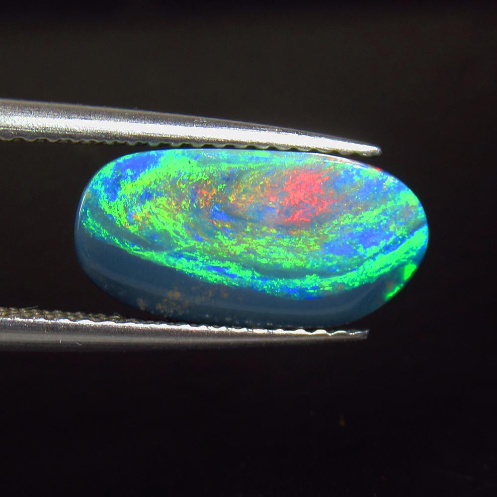 3.46 Ctw Natural Australian Doublet Opal Oval Cabochon: No Reserve! Title: 3.46 Ctw Natural Australian Doublet Opal Oval Cabochon Stone Clarity: Opaque Gemstones: Natural Australian Opal Carat Weights: 3.46 Size/Dimensions: 7.00 x 4.00 x 3.70 mm Additional