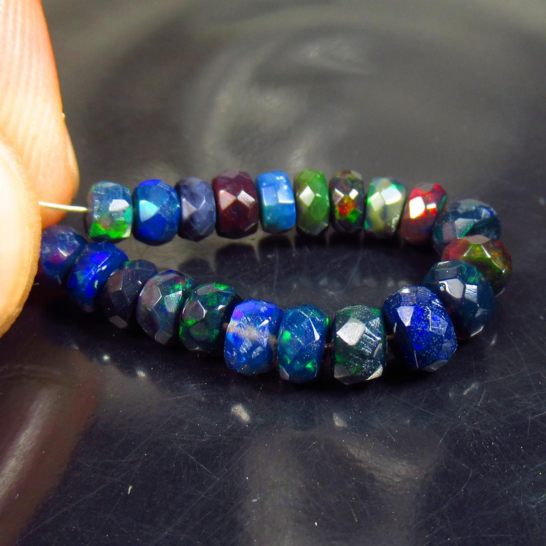 5.90 Ct Natural 21 Drilled Black Faceted Fire Opal Beads: No Reserve! Title: 5.90 Ct Natural 21 Drilled Black Faceted Fire Opal Beads Stone Clarity: Translucent Gemstone: Natural Faceted BlackOpal Beads Carat Weights: 5.90 Size/Dimensions: 3.90 to 5.10 mm / 