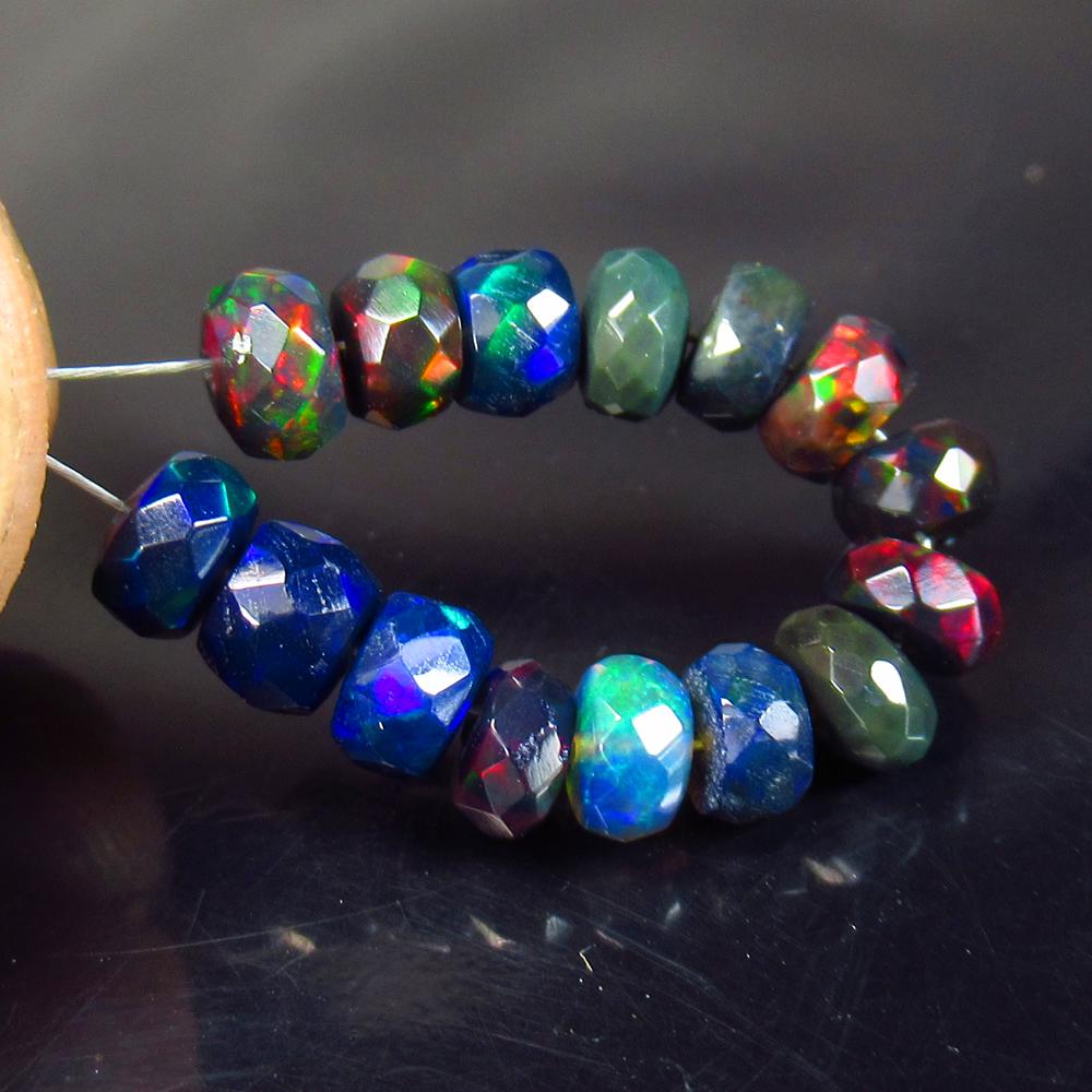 5.46 Ctww Natural 15 Drilled Faceted Black Opal Beads: No Reserve! Title: 5.46 Ctww Natural 15 Drilled Faceted Black Opal Beads Stone Clarity: Translucent Gemstones: Faceted Black Opal Beads Carat Weights: 5.46 Size/Dimensions: 4.70 to 5.00 mm / 15 PC's A