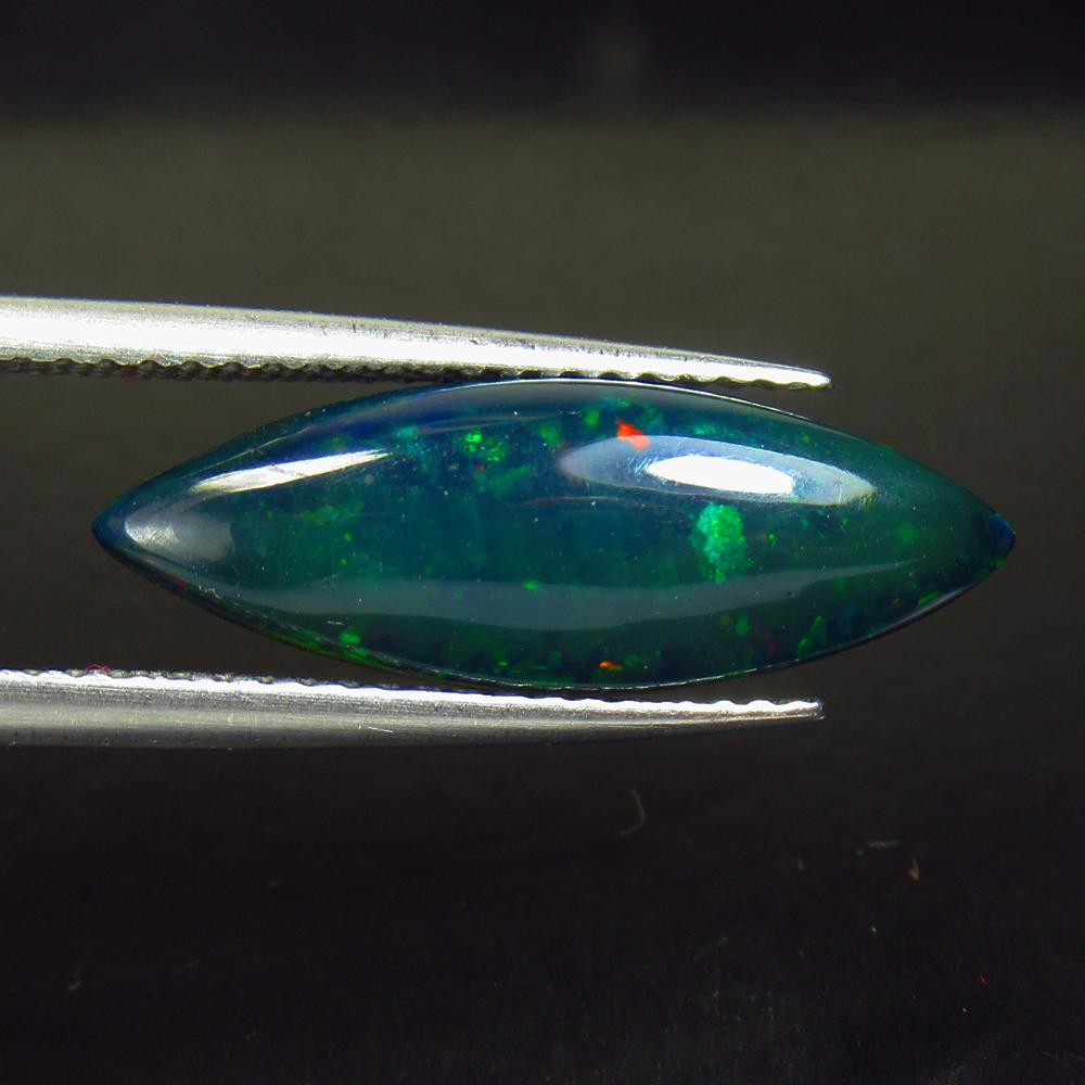 2.40 Ctw Natural Ethiopian Black Fire Opal Marquise Cab: No Reserve! Title: 2.40 Ctw Natural Ethiopian Black Fire Opal Marquise Cab Stone Clarity: Translucent Gemstones: Natural Black Opal Carat Weights: 2.4 Size/Dimensions: 20.00 x 6.30 x 4.10 mm Additiona