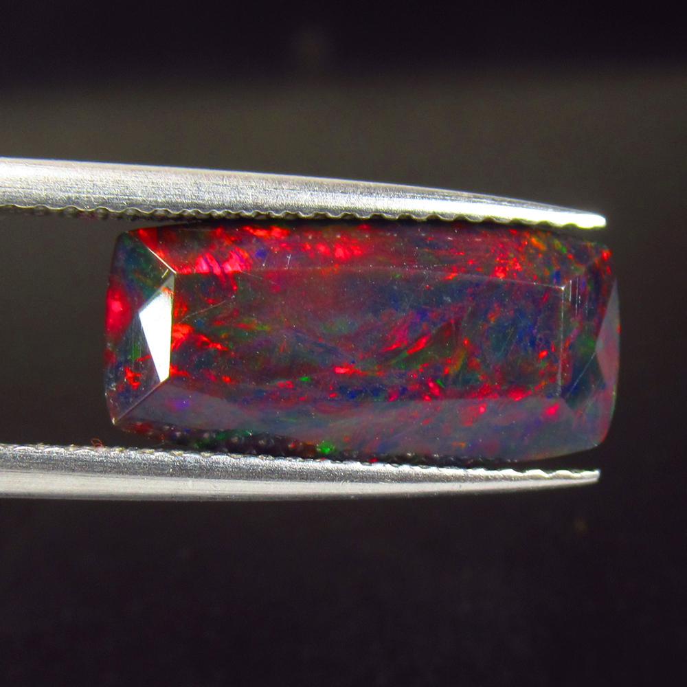 2.64 Ctw Natural Ethiopian Black Fire Opal Cushion Cut: No Reserve! Title: 2.64 Ctw Natural Ethiopian Black Fire Opal Cushion Cut Stone Clarity: Opaque Gemstones: Natural Black Opal Carat Weights: 2.64 Size/Dimensions: 15.30 x 7.50 x 4.60 mm Additional Inf