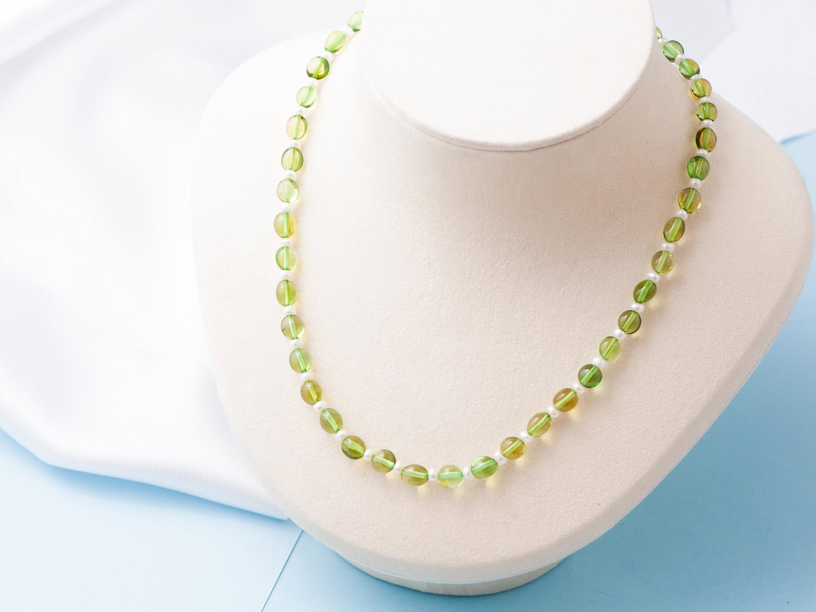 Green amber and Pearl necklace handmade of irregular amber beads and pearl spacers: Title: Green amber and Pearl necklace handmade of irregular amber beads and pearl spacers Materials: Green amber Weight in grams: 11 Additional Information: Unique Necklace is made of Caribbean Green 