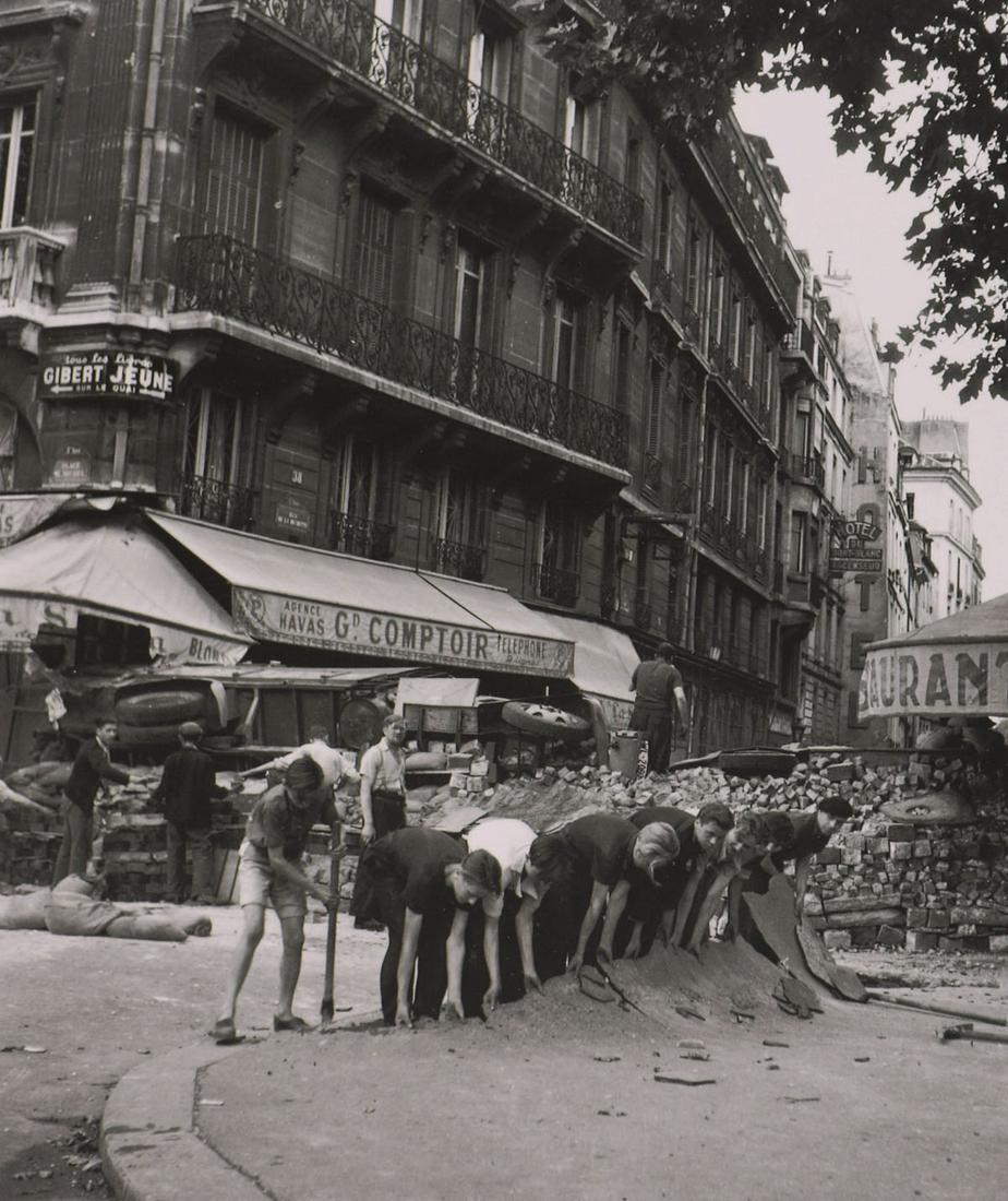 ROBERT DOISNEAU - Place Saint-Michel_August 1944: Artist: ROBERT DOISNEAU - Print Title: Place Saint-Michel_August 1944 Printing Date: 1990’s Medium: Photo-Lithograph Printed in: France Image Size approx.: 8 x 6.5” Robert Doisneau (1912 &