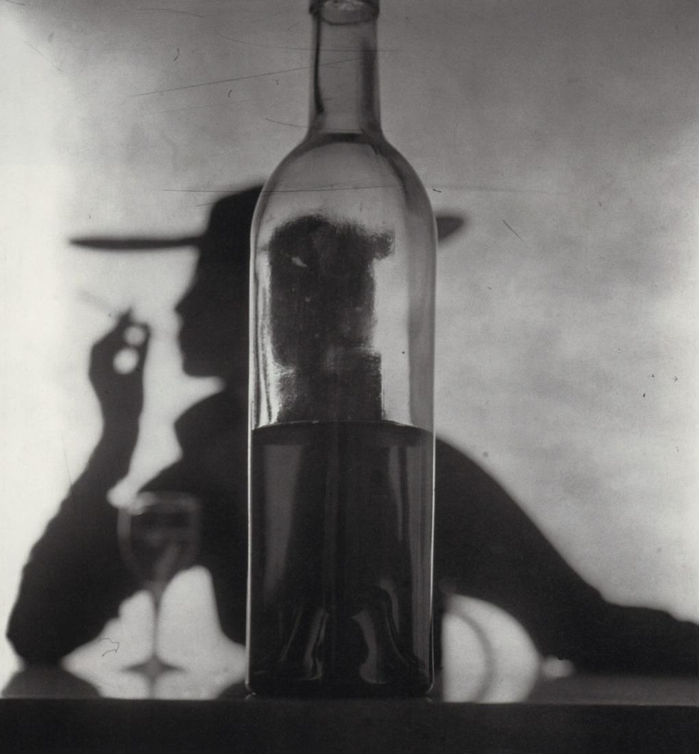 IRVING PENN - Girl Behind Bottle (Jean Patchett), NY, 1949: Artist: IRVING PENN Print Title: Girl Behind Bottle (Jean Patchett), NY, 1949 Medium: Quad-tone Photoengraving Printed 1990’s in the US Image size (inches) approx. 8 x 7.5” Irving Penn was