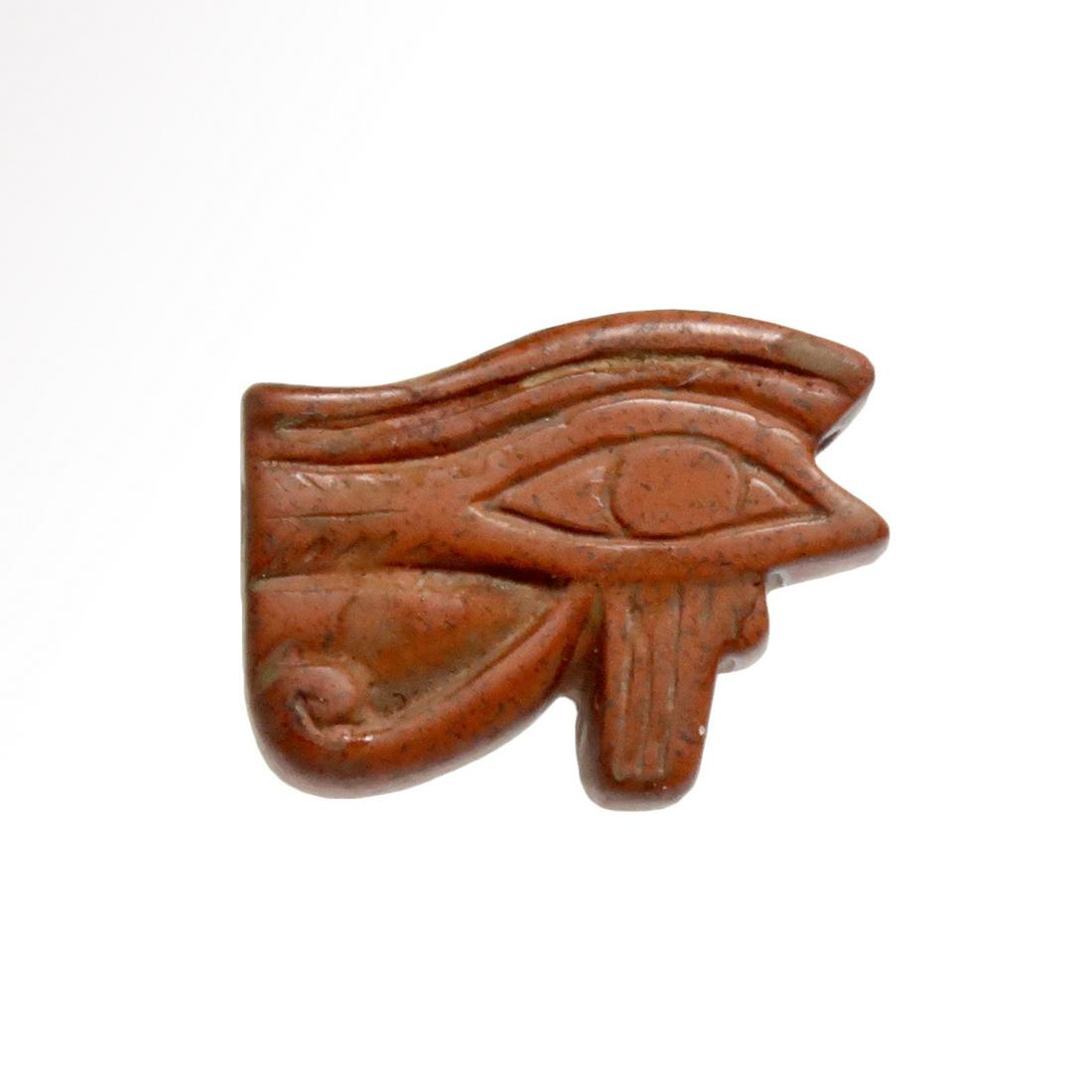 Egyptian Red Jasper Eye Amulet, c. 300 B.C.: Title: Egyptian Red Jasper Eye Amulet, c. 300 B.C. Date/Origin: Egypt, c. 300 B.C. Description: Very attractive bright red jasper eye amulet in immaculate condition. Very fine details. Material: Jaspe