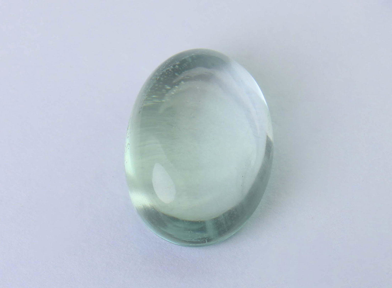 8.41 Cts Natural Aquamarine: Gemstone : Natural Aquamarine Origin : Brazil Weight : 8.41 Carats Dimensions : 14.87x10.74x6.48 mm Shape : Oval Cut Color : Green Transparency : Transparent Clarity : Tranclucent Reserve: $10.00 Sh