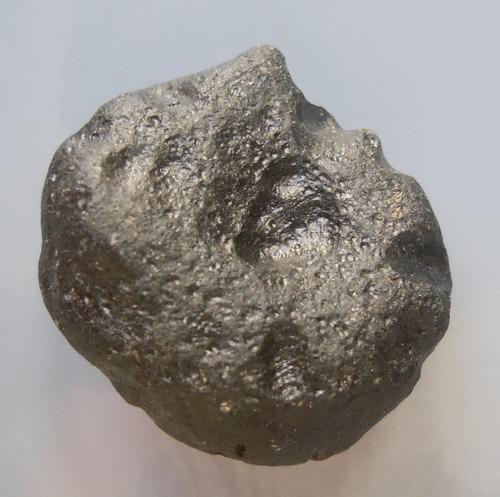 PHILIPPINITE TEKTITE - FROM METEORITE IMPACT: Title: PHILIPPINITE TEKTITE - FROM METEORITE IMPACT Origin: Paracale, Camarines Norte, Luzon, Philippines Size: 2.2x2x1 cm / 22 gram Description: elongate philippinite tektite with flattened and round