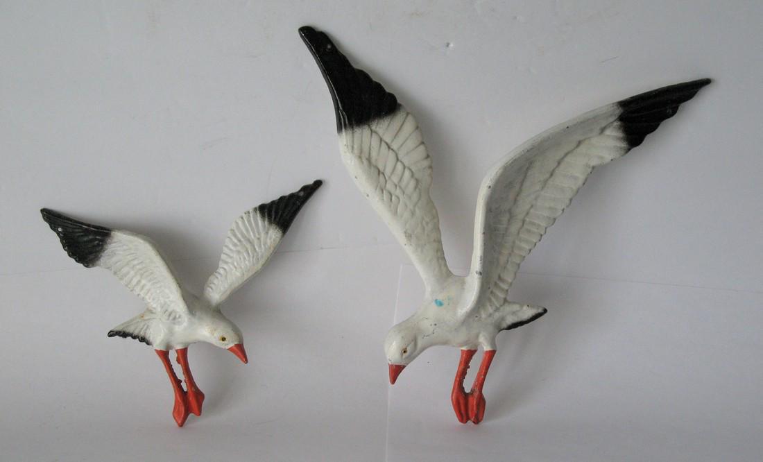 Vintage pair of cast metal seagull wall art.: Title: Vintage pair of cast metal seagull wall art. Date/Period: 1950's Dimension: 9” x 10” & 6” x 7” Additional Information: Nice pair of vintage cast metal seagull wall art d