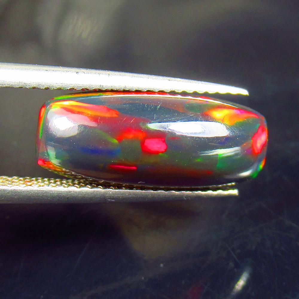 3.38 Ctw Natural Ethiopian Black Fire Opal Cushion Cab: No Reserve! Title: 3.38 Ctw Natural Ethiopian Black Fire Opal Cushion Cab Stone Clarity: Translucent Gemstones: Natural Black Opal Carat Weights: 3.38 Size/Dimensions: 17.00 x 7.20 x 5.10 mm Additiona