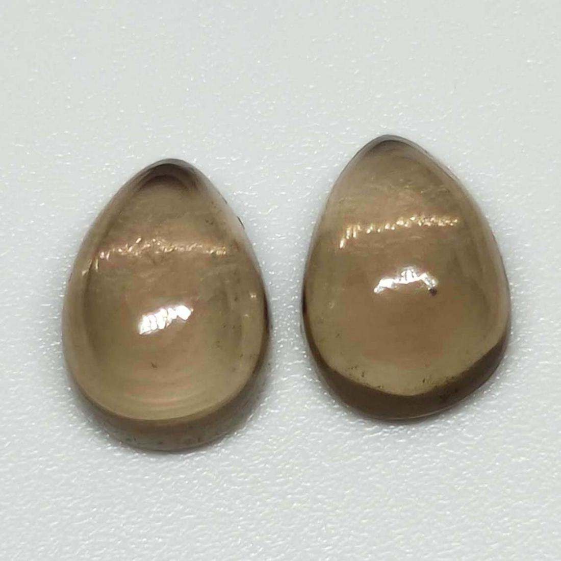 4.75 ct Natural Smoky Quartz Pair: No Reserve! Title: 4.75 ct Natural Smoky Quartz Pair Additional Info: Gemstones: Smoky Quartz Carat Weights: 4.75 ct Size/Dimensions:9.7 x 7 X 4 mm Origin : Scotland Materials: Quartz Weight Unit: Ct 
