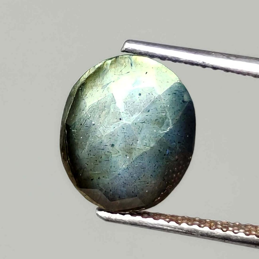 3.60 ct Natural Faceted Labradorite: No Reserve! Title: 3.60 ct Natural Faceted Labradorite Additional Info: Gemstones: Labradorite Carat Weights: 3.60 ct Size/Dimensions:11 X 9 mm Origin : Labrador Materials: Labradorite Weight Unit: Ct