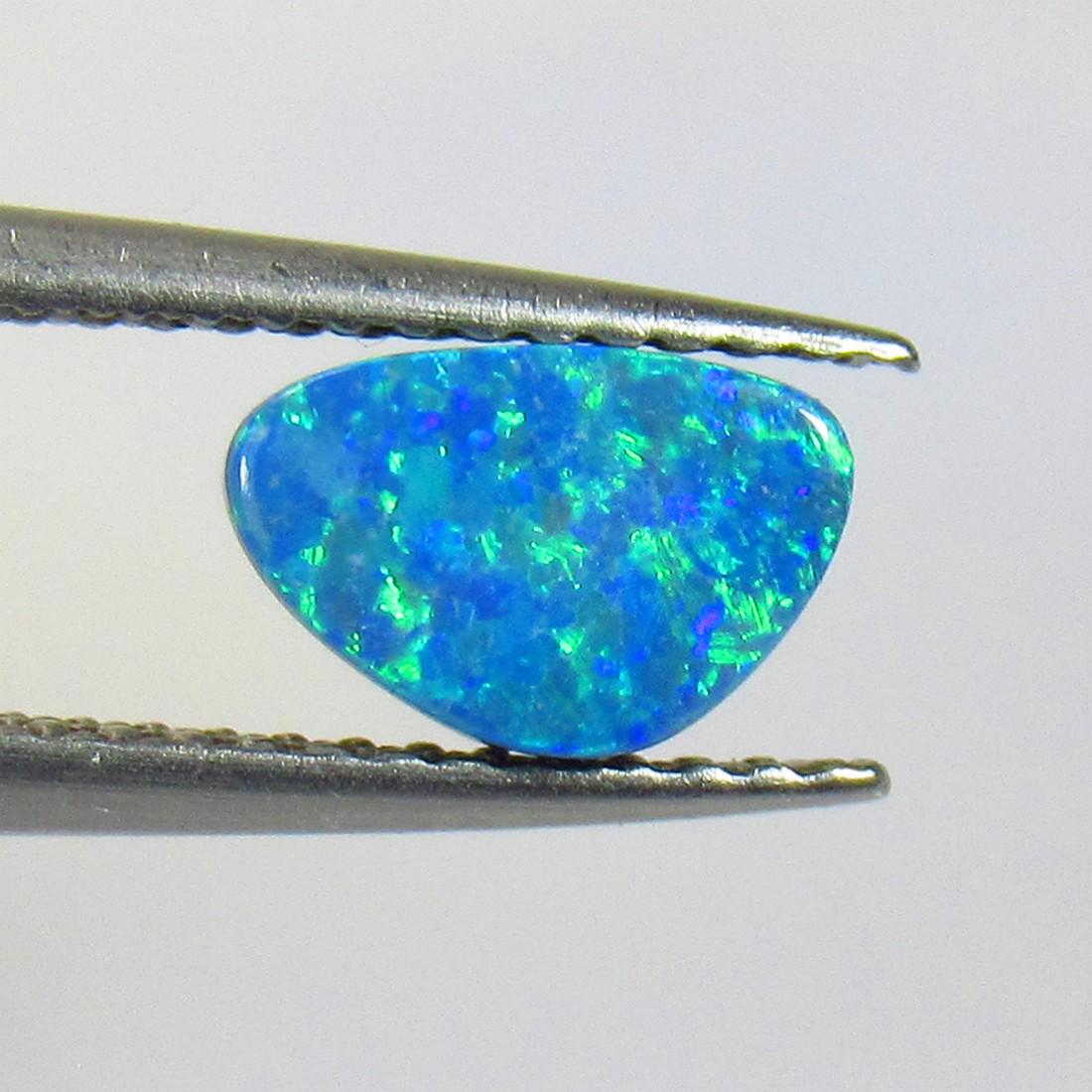 1.08 Ctw Natural Australian Opal Unshaped Cabochon: No Reserve! Title: 1.08 Ctw Natural Australian Opal Unshaped Cabochon Stone Clarity: Opaque Gemstone: Australian Opal Carat Weights: 1.08 Size/ Dimensions: 7.70 x 5.00 x 3.00 mm Additional Info: Nice