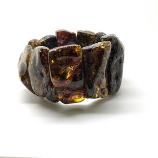 Incredible Vintage Amber Bracelet made from Natural shaped Amber beads: Title: Incredible Vintage Amber Bracelet made from Natural shaped Amber beads Metal: None Gemstones: Amber Weight: 83.8 g Size: Size: 85.0 x 45.0 x 15.0 mm Size: 3.346 x 1.772 x 0.591 inches Bead