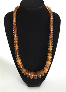 Phenomenal Unique Vintage Amber Necklace made from Doughnut shaped Amber beads: Title: Phenomenal Unique Vintage Amber Necklace made from Doughnut shaped Amber beads Metal: None Gemstones: Amber Weight: 98.0 g Size: Bead size: 24.7 x 12.5 mm Made of: Whole Stone Additional